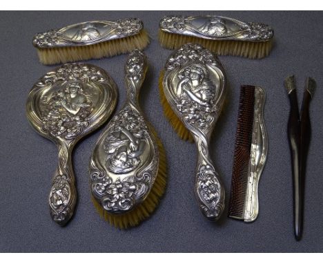 ART NOUVEAU SILVER DRESSING TABLE SET (7 ITEMS) including hand mirror and four brushes, Birmingham 1905, makers Henry Matthew