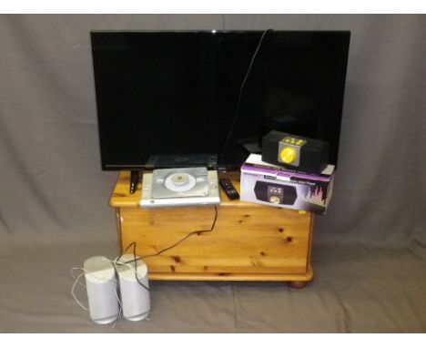 POLAROID FLATSCREEN TV WITH REMOTE on a pine lidded box stand, modern, with a boxed quantity of small electricals E/T