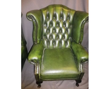 ANTIQUE STYLE BUTTON BACK GREEN LEATHER EFFECT WING BACK ARMCHAIR, 109cms H, 83cms W, 52cms seat D