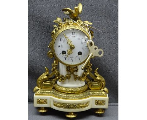 GILT BRASS &amp; MARBLE FRENCH DRUM CASED MANTEL CLOCK, floral decorated white enamel dial set with Arabic numerals before a 