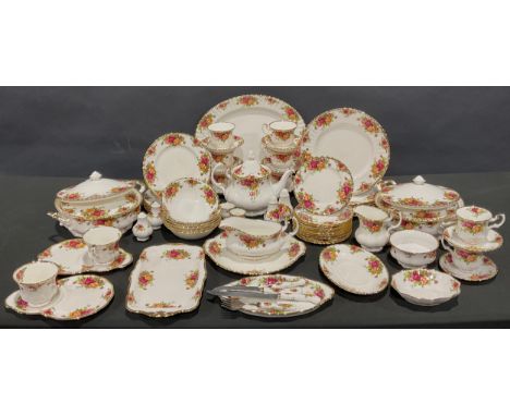 A Royal Albert Old Country Roses dinner and tea service for six, comprising vegetable dishes and cover, dinner plates, desser
