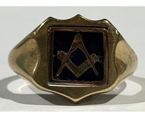 Freemasonry - a gentleman's 9ct gold masonic signet ring, with monogrammed shield shaped swivel emblem, compass on black enam
