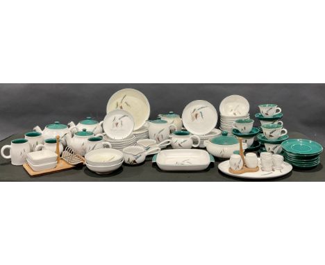 A Denby Greenwheat part dinner and tea service, comprising vegetable dish, sauce boats and stands, dinner plates, dessert pla