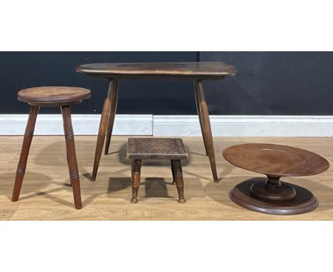A mid 20th century Ercol coffee table, with CC41 290 stamp, 46cm high, 42cm wide, 68cm long; a mahogany lazy Susan, 37cm diam