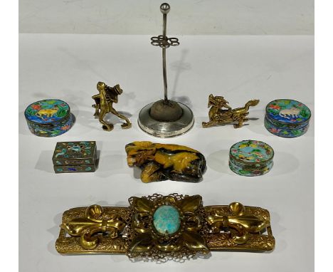 An Art Nouveau brass belt buckle, set with an oval cabochon; Chinese enamel boxes; a Chinese soapstone carving of an ox; etc 