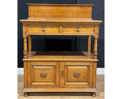 An Arts &amp; Crafts period oak buffet serving cabinet, c.1920 