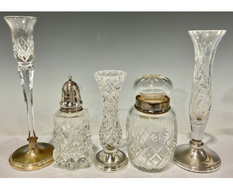 A silver mounted pickle jar; a silver mounted sugar caster; two silver mounted vases; a silver mounted candlestick (5) 
