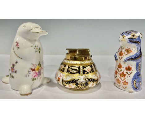 A Royal Crown Derby paperweight, Chipmunk, 10cm high; a Posies pattern paperweight, Platypus, gold stopper, 12cm high; an 112
