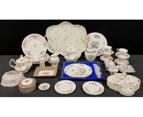 A Royal Albert Moss Rose pattern part dinner and tea service; a Coalport Strawberry pattern three piece strawberry basket; a 