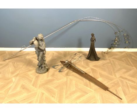 A group of four garden display items to include two resin figures, a decorative metal figure of a dragonfly, 100cms long x 69