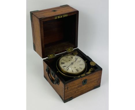 A mid 19th century Richard Hornby marine chronometer, no. 213, housed in a mahogany and brass bound box, mounted on a brass g