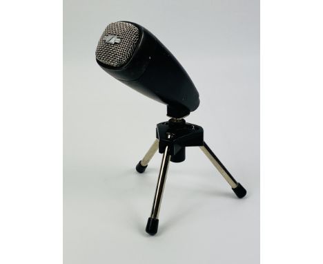 A Sennheiser MD 21-U microphone on tripod stand. Estimate: £40-60