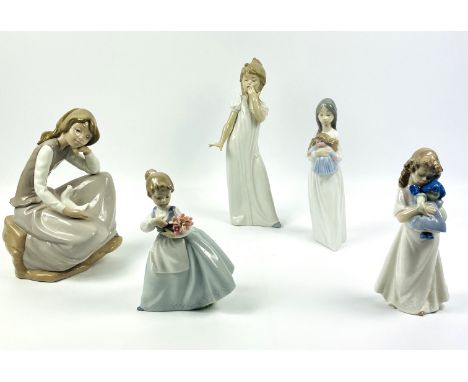 A group of five Nao by Lladro porcelain figures, with backstamps to the underside, tallest 28.5cm high. Estimate £15-30.