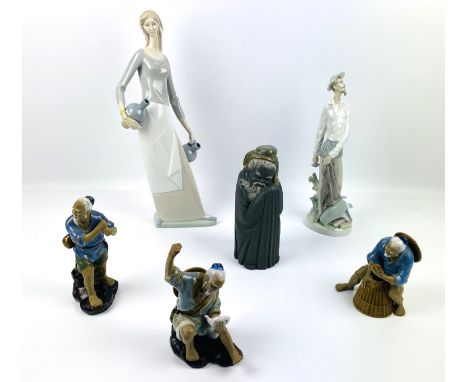 Two Lladro figurines, 20.5cms high and 30.5cms high; together with a Nao figurine, 40cms high, three Chinese mud men figurine