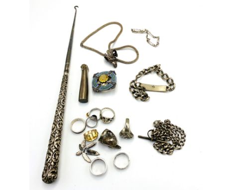 A quantity of silver and white metal jewellery together with a silver handled button hook. Estimate: £50-70