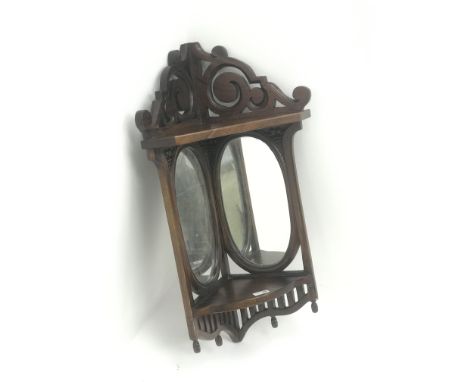 20th century mahogany wall hanging corner shelf fitted with two oval mirrors, W45cm, H83cm, D34cm Condition Report Click here