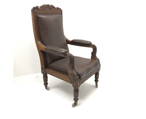 Early Victorian mahogany framed high back library armchair, scrolled foliage carved top rail, s-scroll arms carved with acant