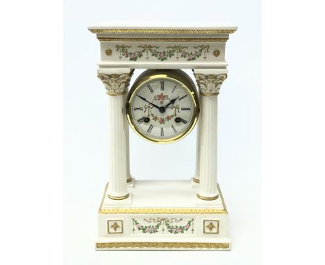 Porcelain 'Empress Josephine' portico clock decorated with roses, by Franklin Mint, Roman dial, striking the half hours on tw