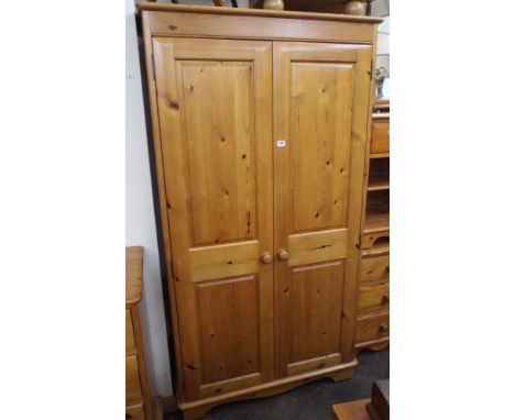 A modern pine two door wardrobe, 3' wide 