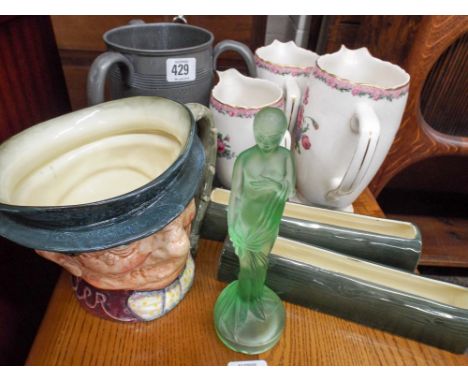 A pewter tyg, Doulton mask jug, a set of three floral jugs, two Susie Cooper bough cots etc 