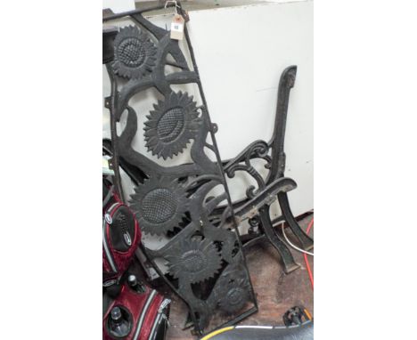 Pair of metal ended Victorian style bench ends with a metal back