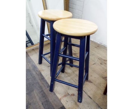 A pair of light beech and blue painted kitchen stools