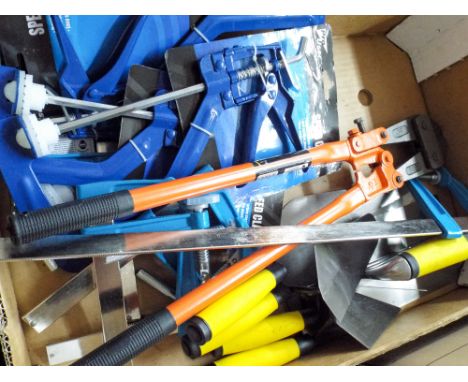 A quantity of new tools including bricklayers plasterers trowels, bolt croppers, speed clamps, F clamps etc 