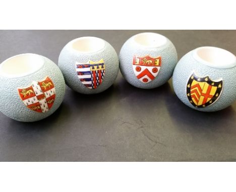 MATCHBOX, hardware, set of four pottery match holders/strikers, blue ball-shaped design with raised Cambridge College crests,