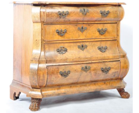 A 19th Century antique walnut commode chest of drawers of serpentine bombe form having a stunning quarter panel veneer top. T