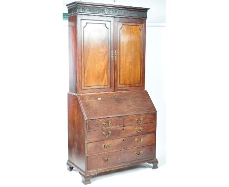 A stunning 18th Century Georgian English antique mahogany estate bureau cabinet bureau bookcase. Blind fretwork gothic carved