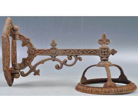 A 19th Century Victorian English antique Gothic revival cast iron oil lamp wall sconce, likely from a church or cathedral. Lo