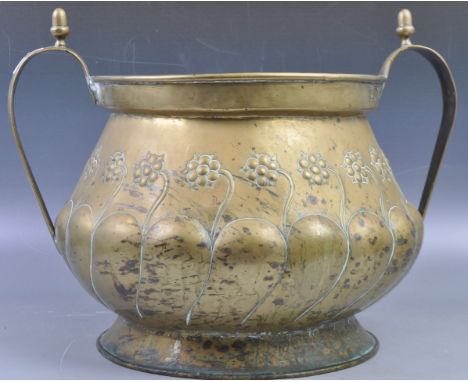 A 19th Century Victorian Art Nouveau brass twin handled planter jardiniere having twin acorn finial handles with half gadroon