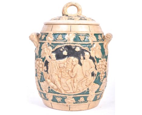 An antique 19th century Bavarian / German large stoneware glazed wine barrel. The barrel profusely decorated with leaves, gra