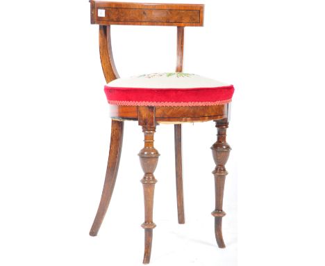 A 19th Century English antique walnut harpist stool / chair having a curved oyster veneered back rest with round tapestry uph