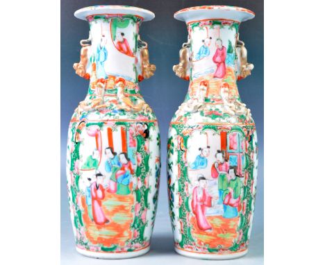 A pair of 19th Century Chinese Cantonese Canton porcelain vases of begonia shape decorated in the famille rose pattern having