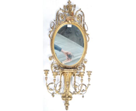 A fantastic 19th Century Victorian Adams style gilt framed Girandole mirror of oval form with gilded gesso wood frame having 