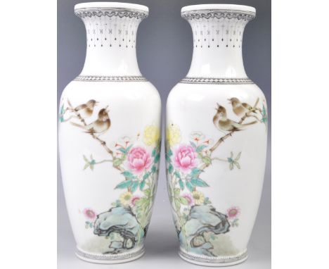 A true mirrored pair of Chinese Republic period Qianlong mark porcelain vases. The hand painted glazed vases of rouleau form 