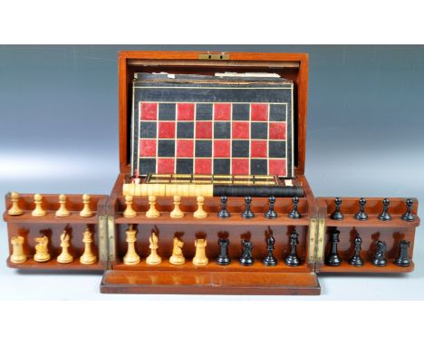 A stunning 19th Century Victorian English antique mahogany games compendium box. This fully appointed example having a full c