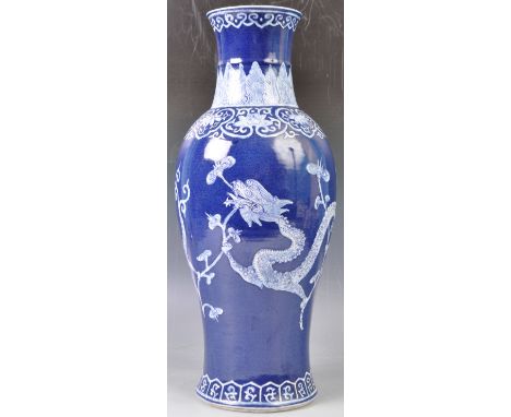 A large 19th Century Chinese Kangxi revival powr blue ground antique porcelain vase having deep cobalt blue and white decorat