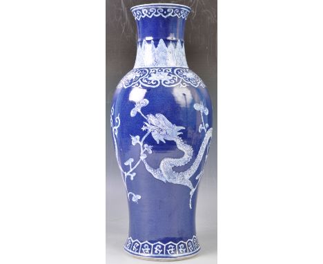 A large 19th Century Chinese Kangxi revival powr blue ground antique porcelain vase having deep cobalt blue and white decorat