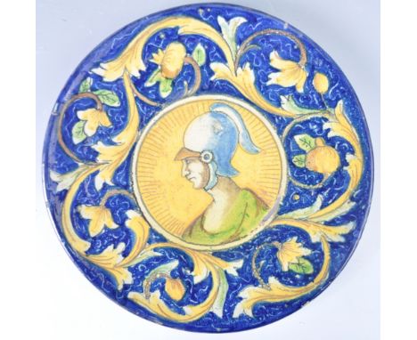 A 19th Century Italian antique Majolica Faience tin glazed earthenware pottery charger plate having hand painted decoration d