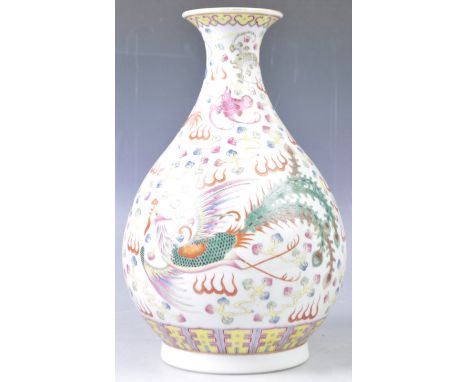 A stunning 19th Century Chinese Guangxu mark and period porcelain vase of pear shape having hand painted decoration in Wucai 