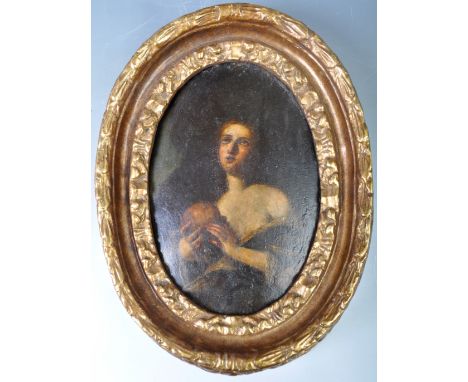 A rare 17th Century Italian oil on board painting depicting The Penitent Mary Magdalene holding skull looking upwards towards