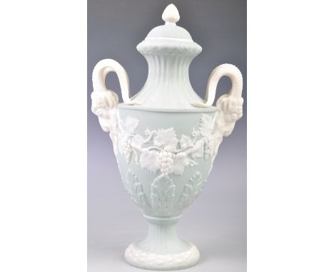 A fine 19th Century English antique Adams ceramic urn and cover in the manner of Flaxman for Wedgwood. The urn having celeste