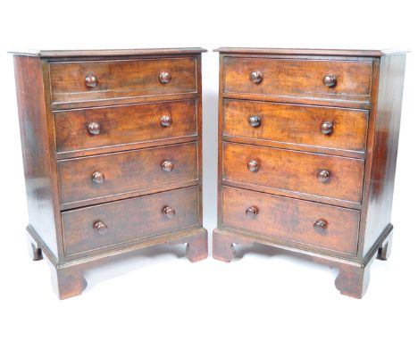 A rare and stunning pair of 19th Century Victorian English antique mahogany chest of drawers of great proportions. The straig