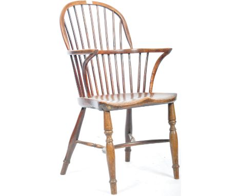 A late 18th Century Georgian English antique yew and elm wood windsor chair armchair having a yew wood spindle come back, sha