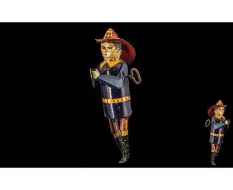 Marx Type Vintage Key Wind Tin Toy, 'Fireman Pulling the Rope' figure; Made in England, circa 1930s/40s; 8 inches (20cms) lon
