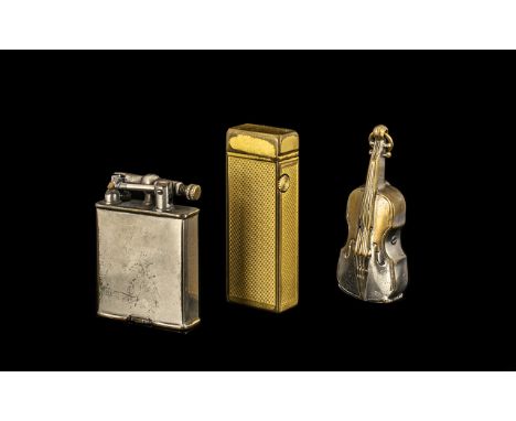 Unusual Violin Shaped Plated Metal Vesta Case  with two vintage lighters, The Eureka and a gold plated Dunhill gas lighter.