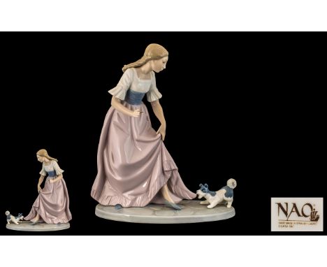 Nao by Lladro Large Hand Painted Porcelain Figure ' Girl with Small Terrier ' c.1990's. Height 11.75 Inches - 28.90 cms. 1st 