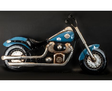 Pressed Tin Wall Plaque in the Shape of a Harley Davidson Motor Bike, picked out in blue livery with chrome fittings; 30 inch